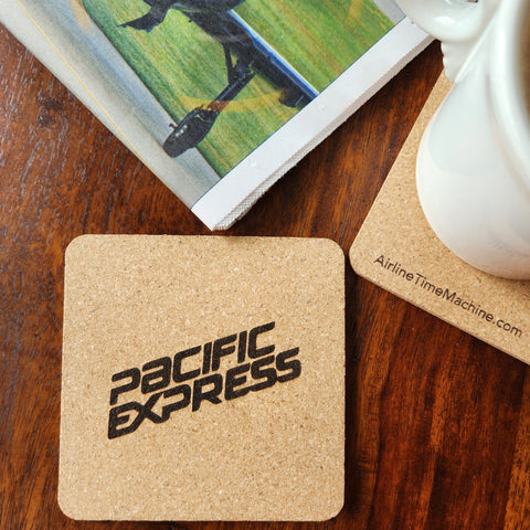 Image of cork coaster with Pacific Express Airlines branding impression.