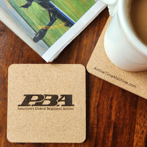 Image of cork coaster with Provincetown-Boston Airlines branding impression.