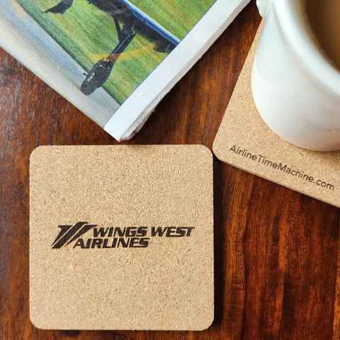 Image of cork coaster with Wings West Airlines branding impression.