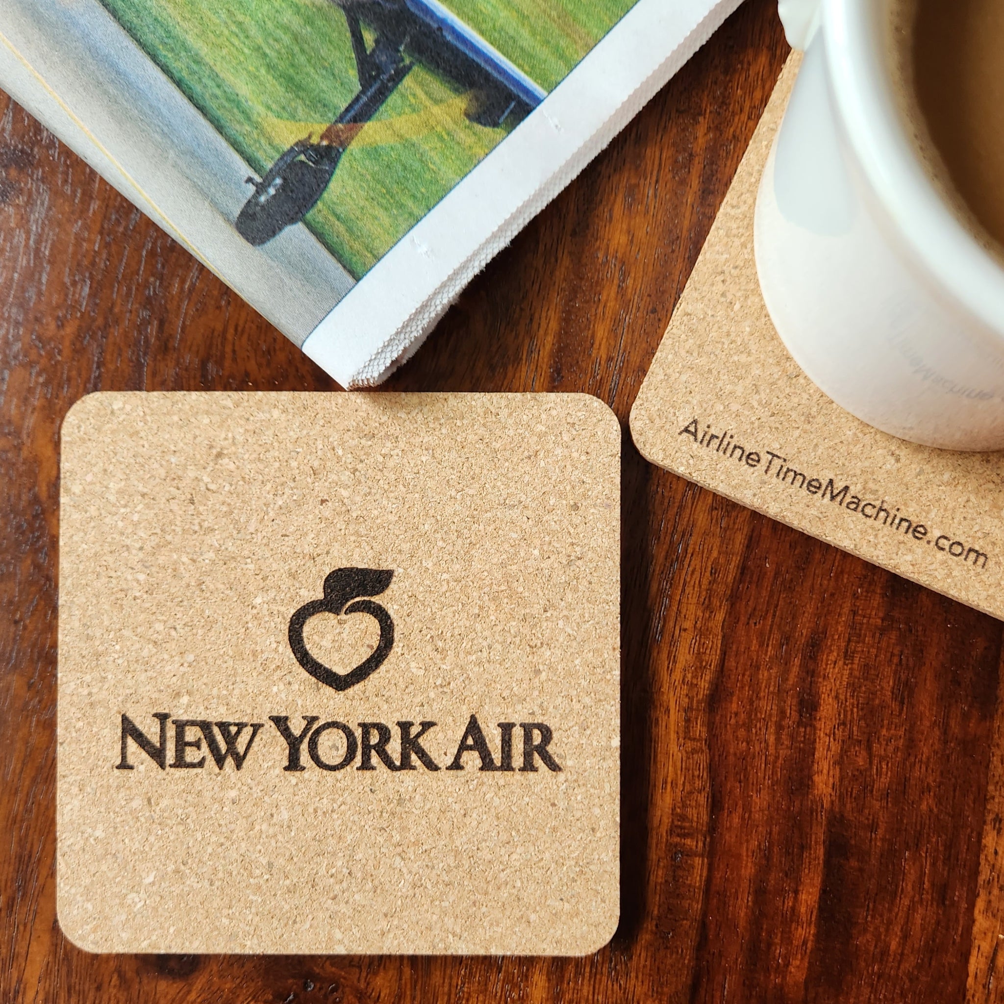 Image of cork coaster with New York AIr branding impression.