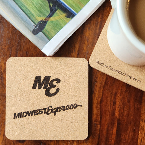 Image of cork coaster with Midwest Express Airlines branding impression.