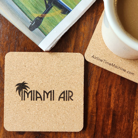 Image of cork coaster with Miami Air branding impression.