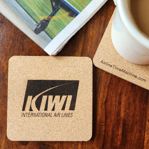 Image of cork coaster with Kiwi International Airlines branding impression.