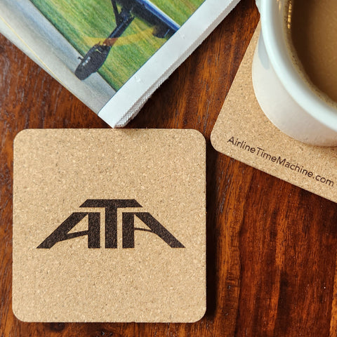 Image of cork coaster with American Trans Air (ATA) branding impression.