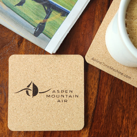 Image of cork coaster with Aspen Mountain AIr branding impression.