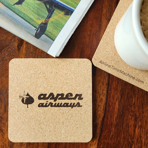 Image of cork coaster with Aspen Airways branding impression.