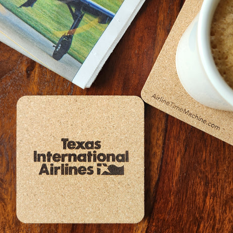 Image of cork coaster with Texas International Airlines branding impression.