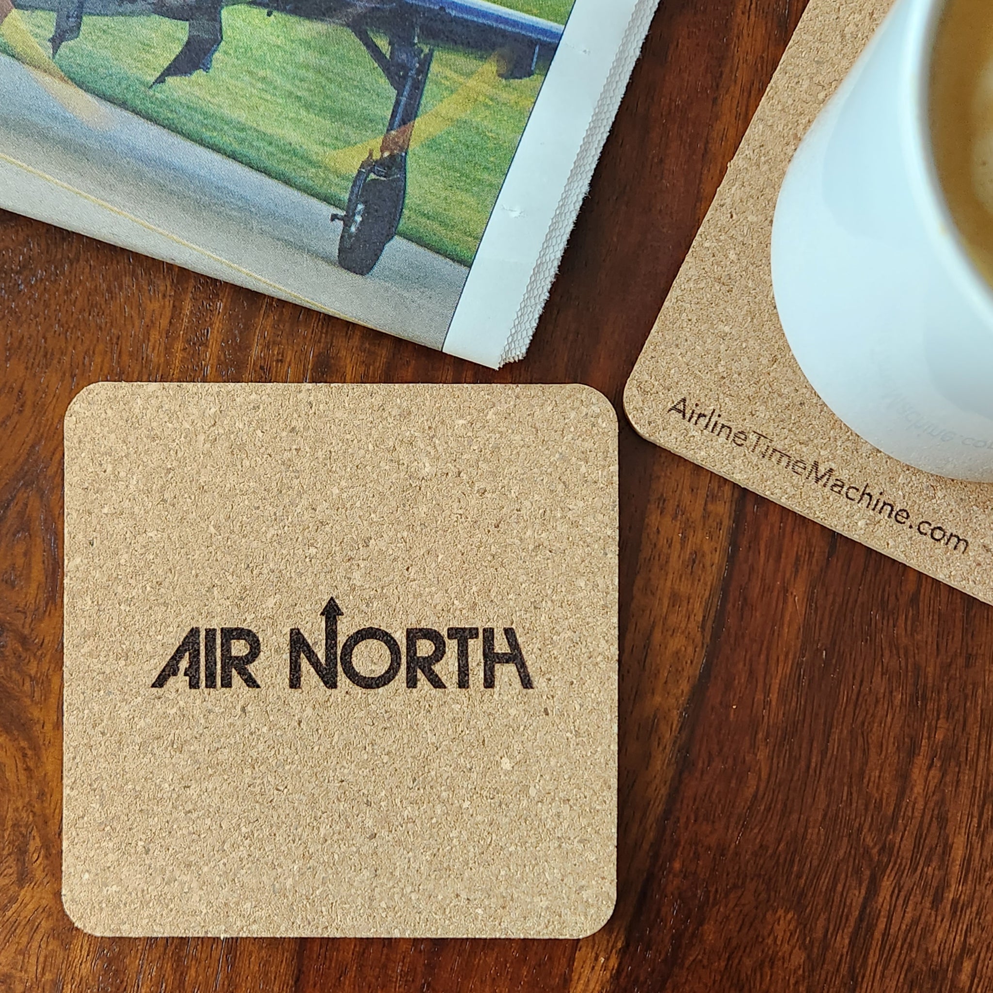 Image of cork coaster with Air North branding impression.