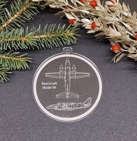 Image of acrylic round ornament with engraving of a Beechcraft 99.