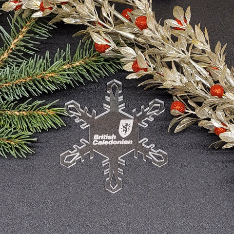 Image of acrylic snowflake ornament with British Caledonian branding impression.
