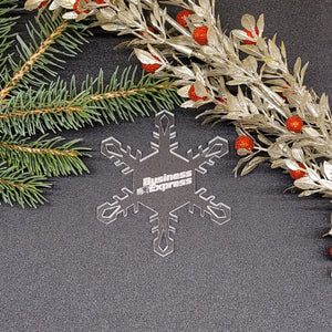 Image of acrylic snowflake ornament with Business Express Airlines branding impression.