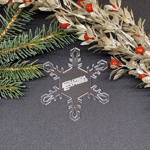 Image of acrylic snowflake ornament with Florida Express Airlines branding impression.