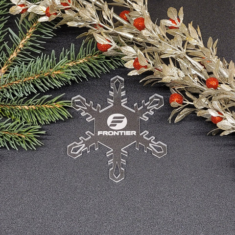 Image of acrylic snowflake ornament with Frontier Airlines branding impression.