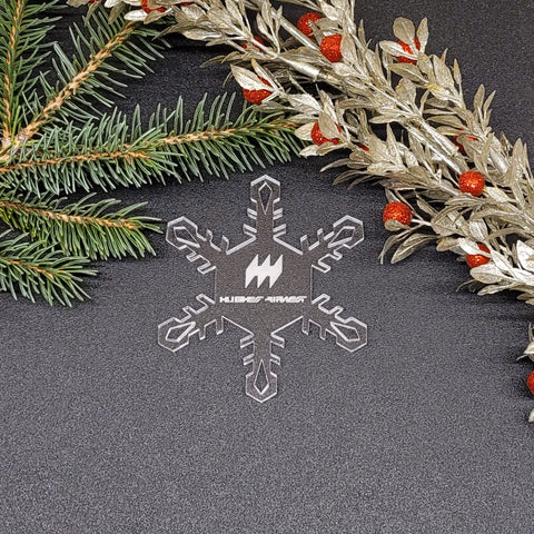 Image of acrylic snowflake ornament with Hughes Airwest branding impression.