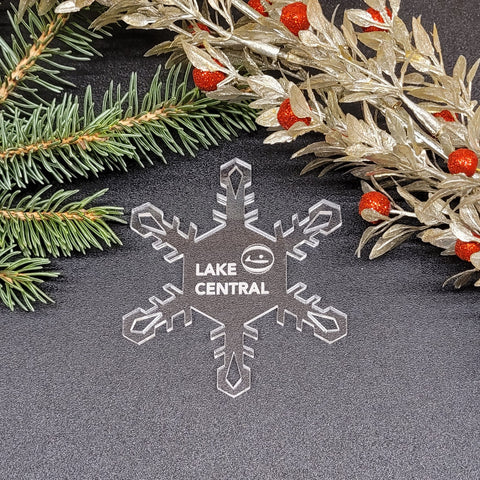 Image of acrylic snowflake ornament with Lake Central Airlines branding impression.